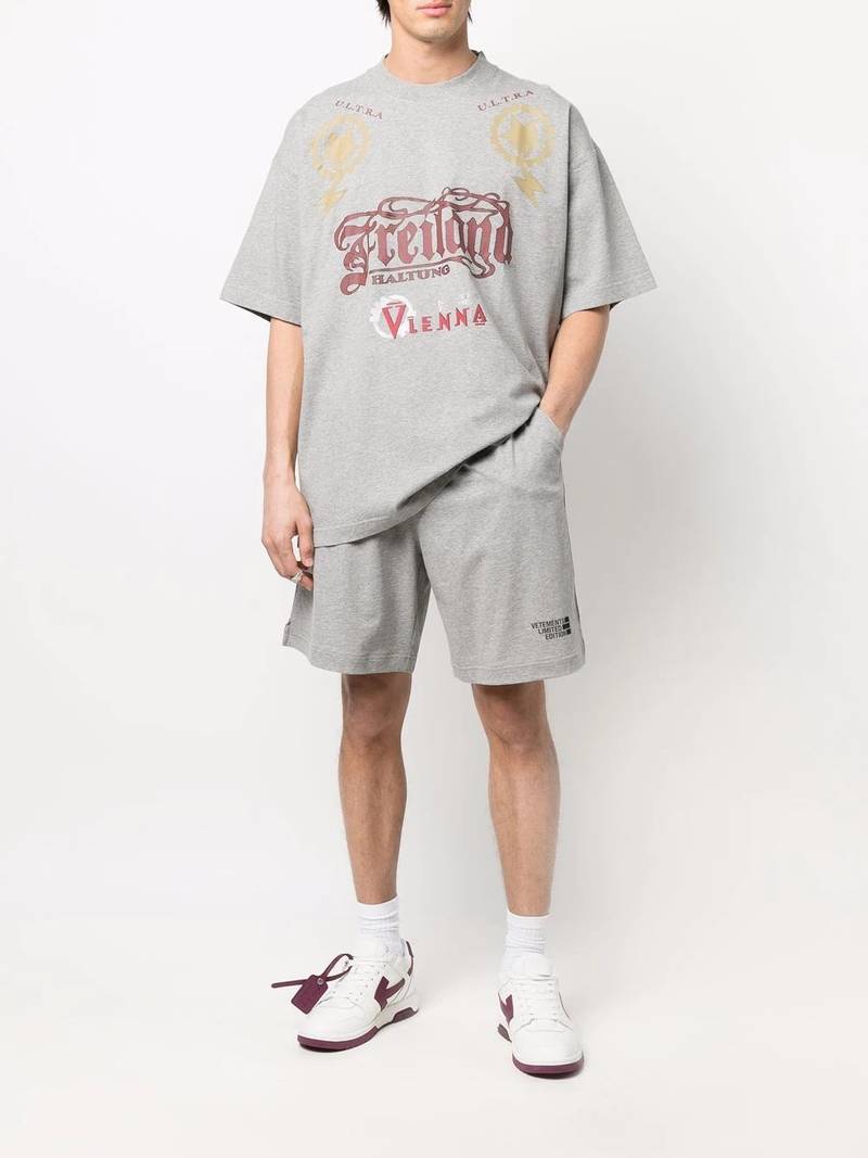 VETEMENTS logo-prin track shorts outlook