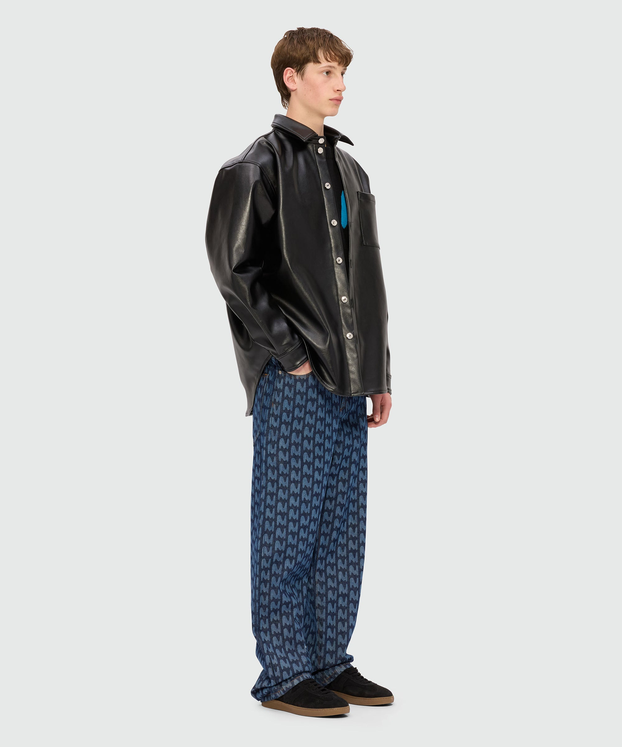 Blue laser-cut denim trousers with "TheMwave" motif - 4