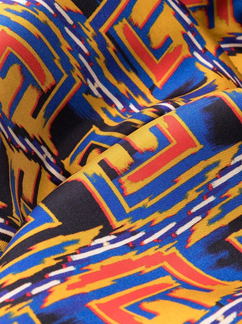 graphic-print cropped trousers 7