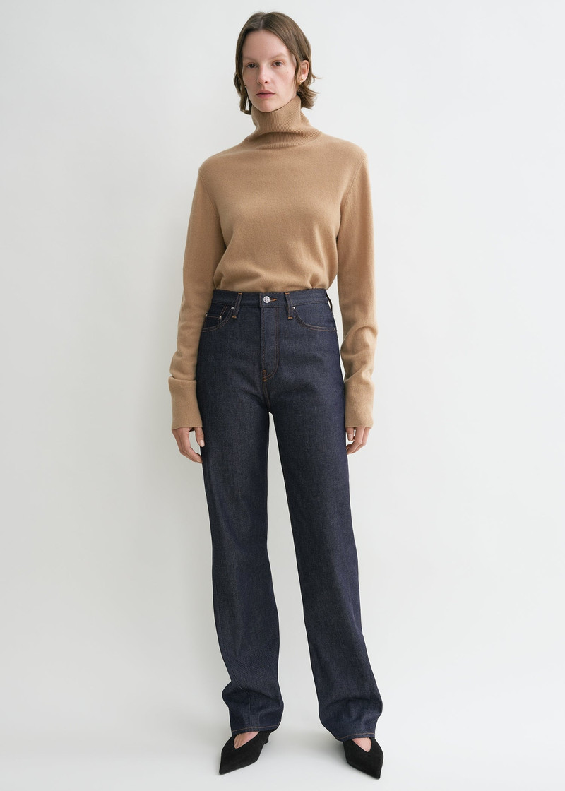 Totême Twisted seam denim full length raw outlook