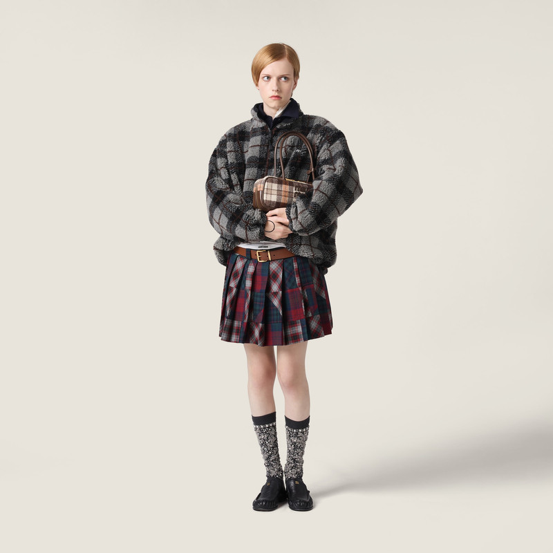 Miu Miu Pleated plaid patchwork miniskirt outlook
