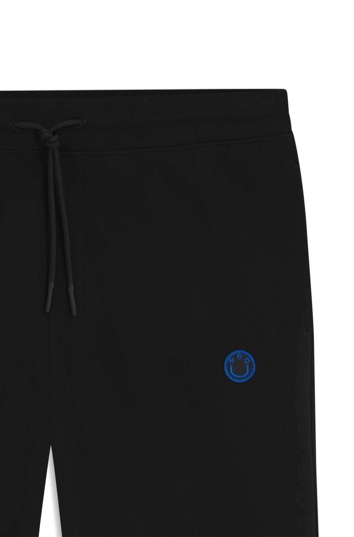 COTTON-TERRY TRACKSUIT BOTTOMS WITH HAPPY HUGO LOGO PATCH - 6