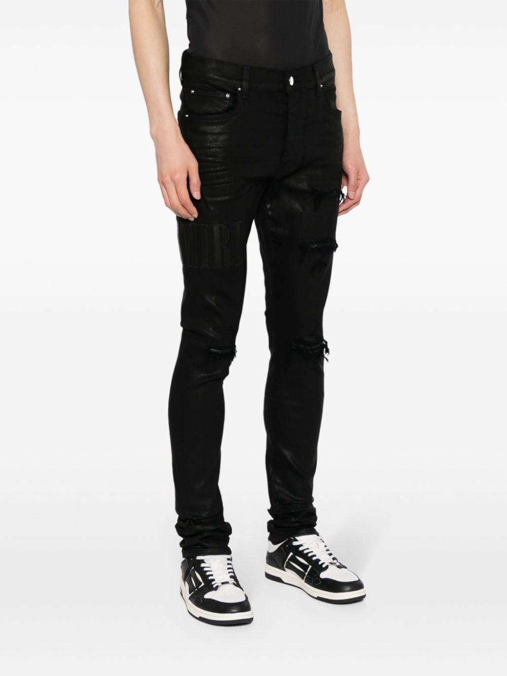 logo-embroidered distressed slim-cut jeans - 3