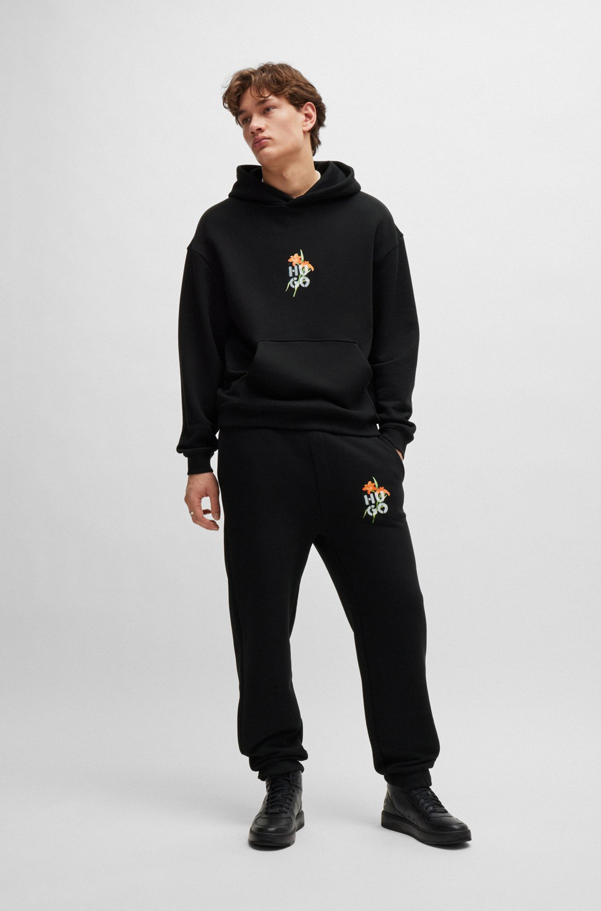 RELAXED-FIT TRACKSUIT BOTTOMS WITH FLORAL LOGO ARTWORK - 4