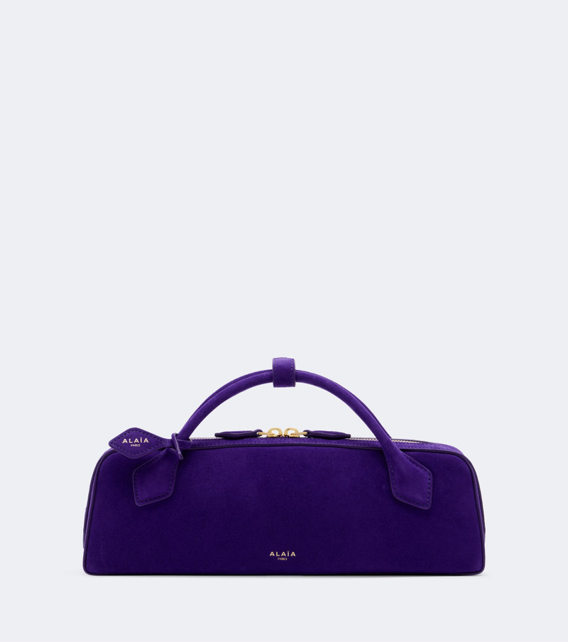 Le Teckel Small suede clutch 1