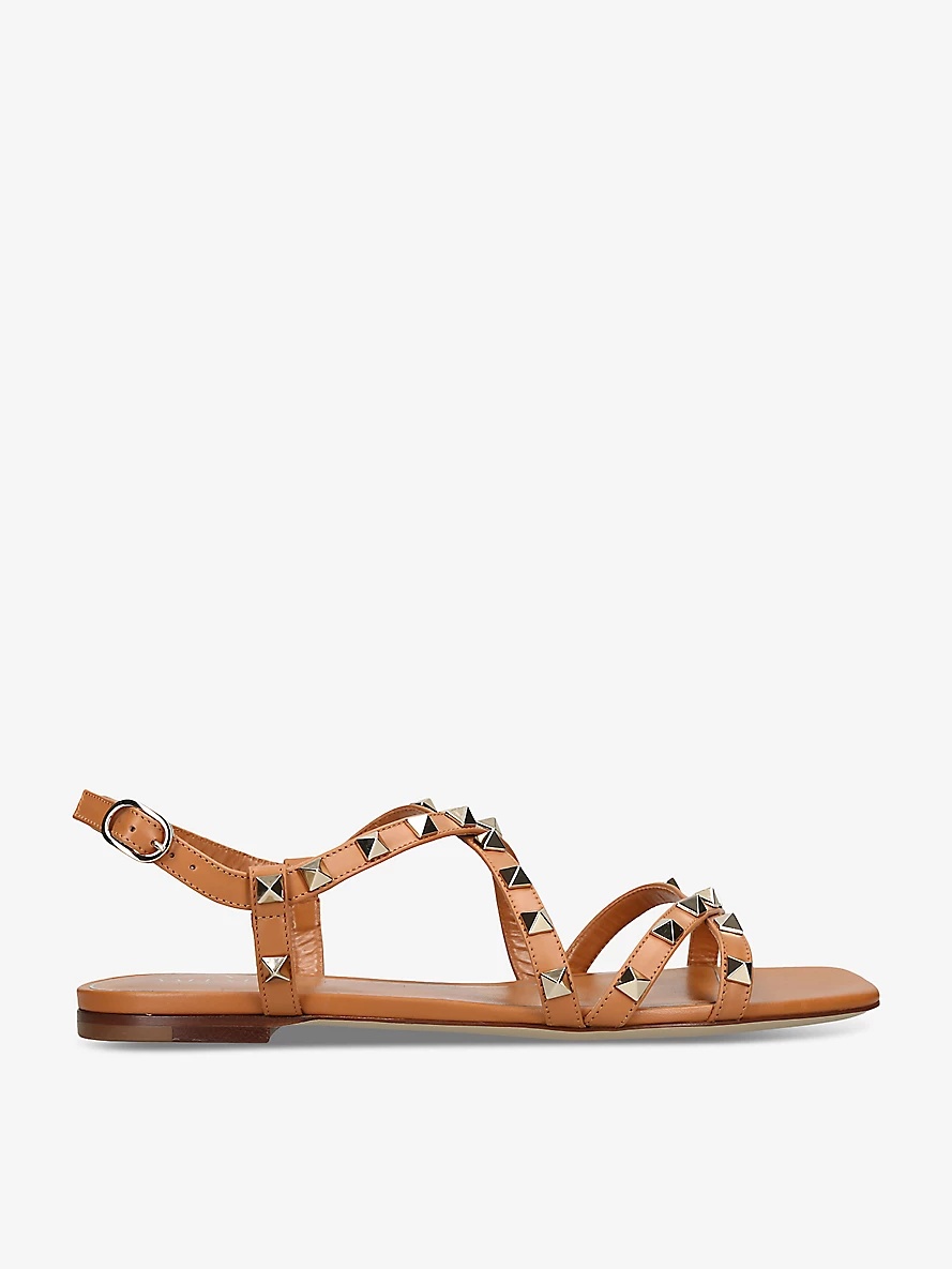 Rockstud embellished flat leather sandals - 1