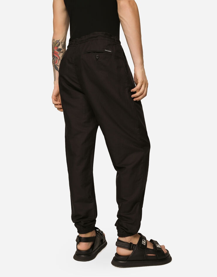 Linen and cotton jogging pants with logo label - 4