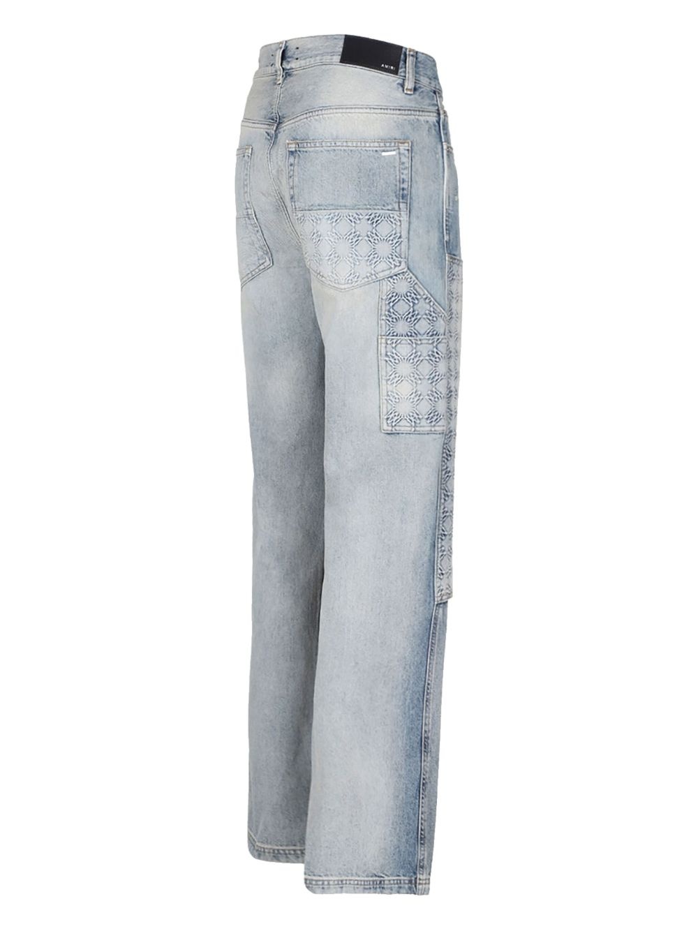 monogram-debossed jeans - 3