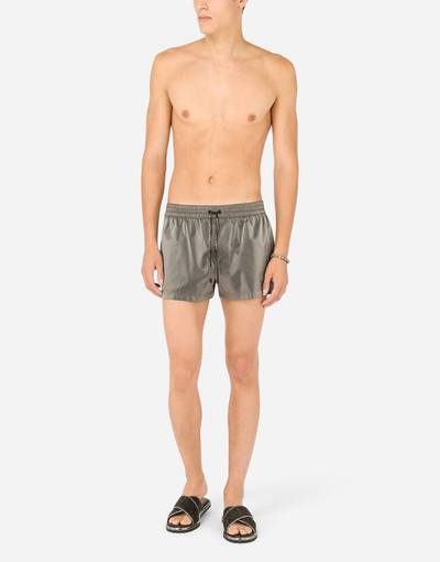 Dolce & Gabbana Short iridescent nylon swim trunks with patch outlook