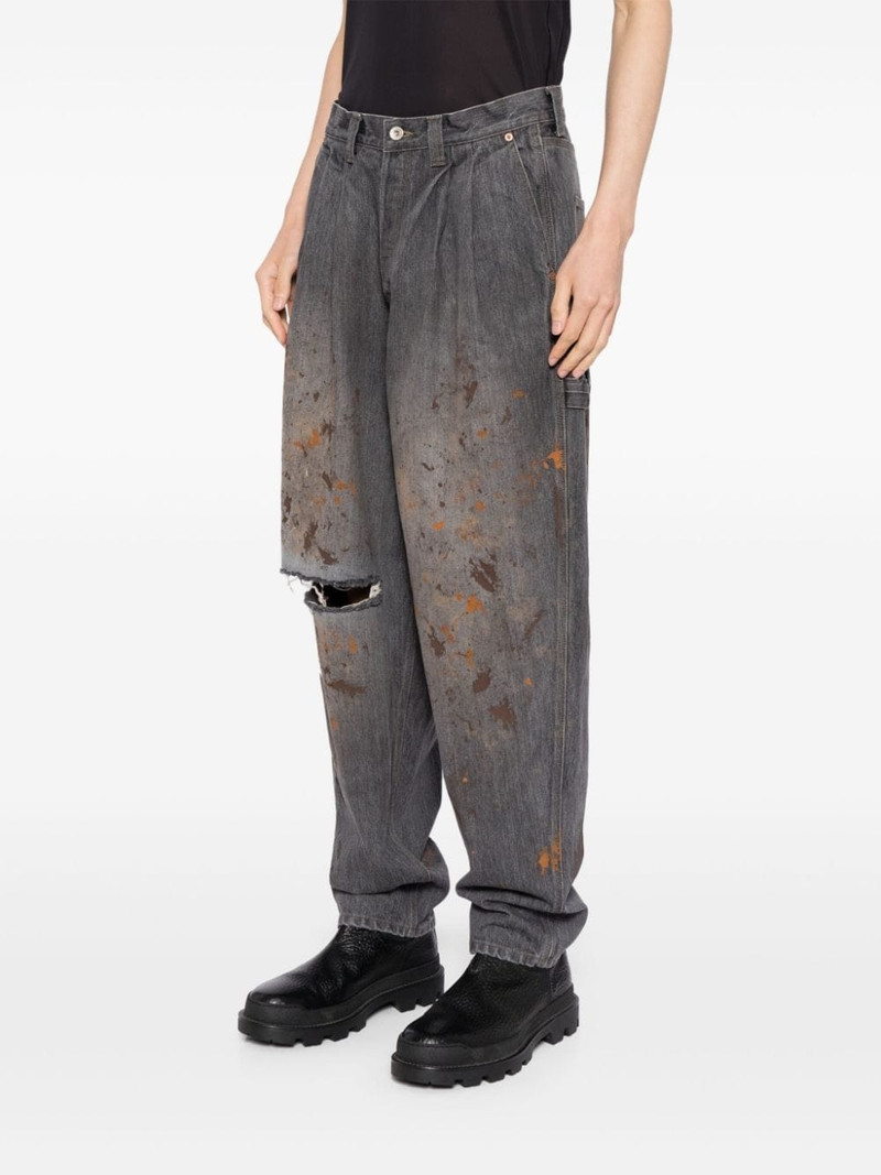 spray-paint effect tapered jeans 3