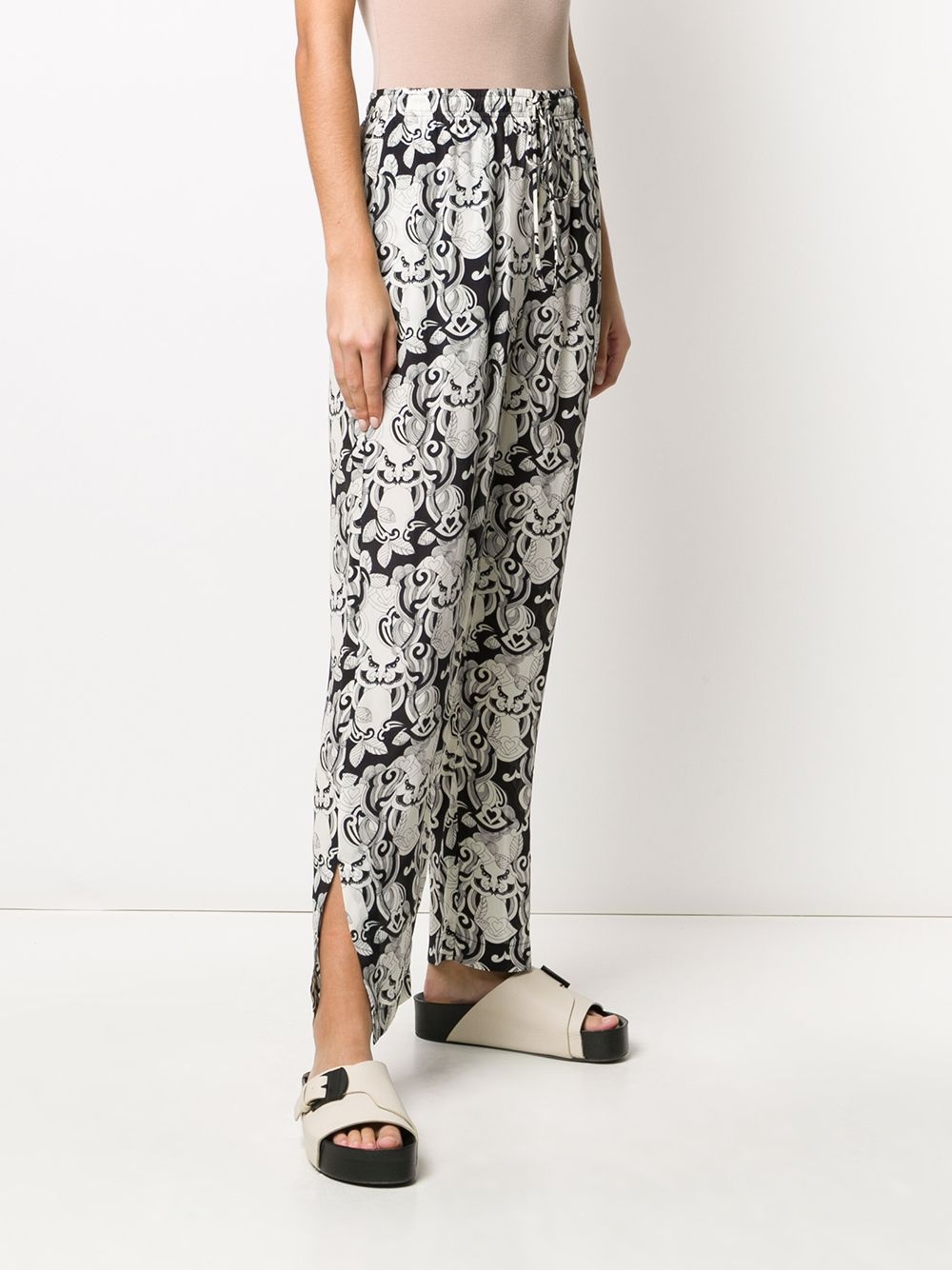 abstract print tapered trousers  - 3