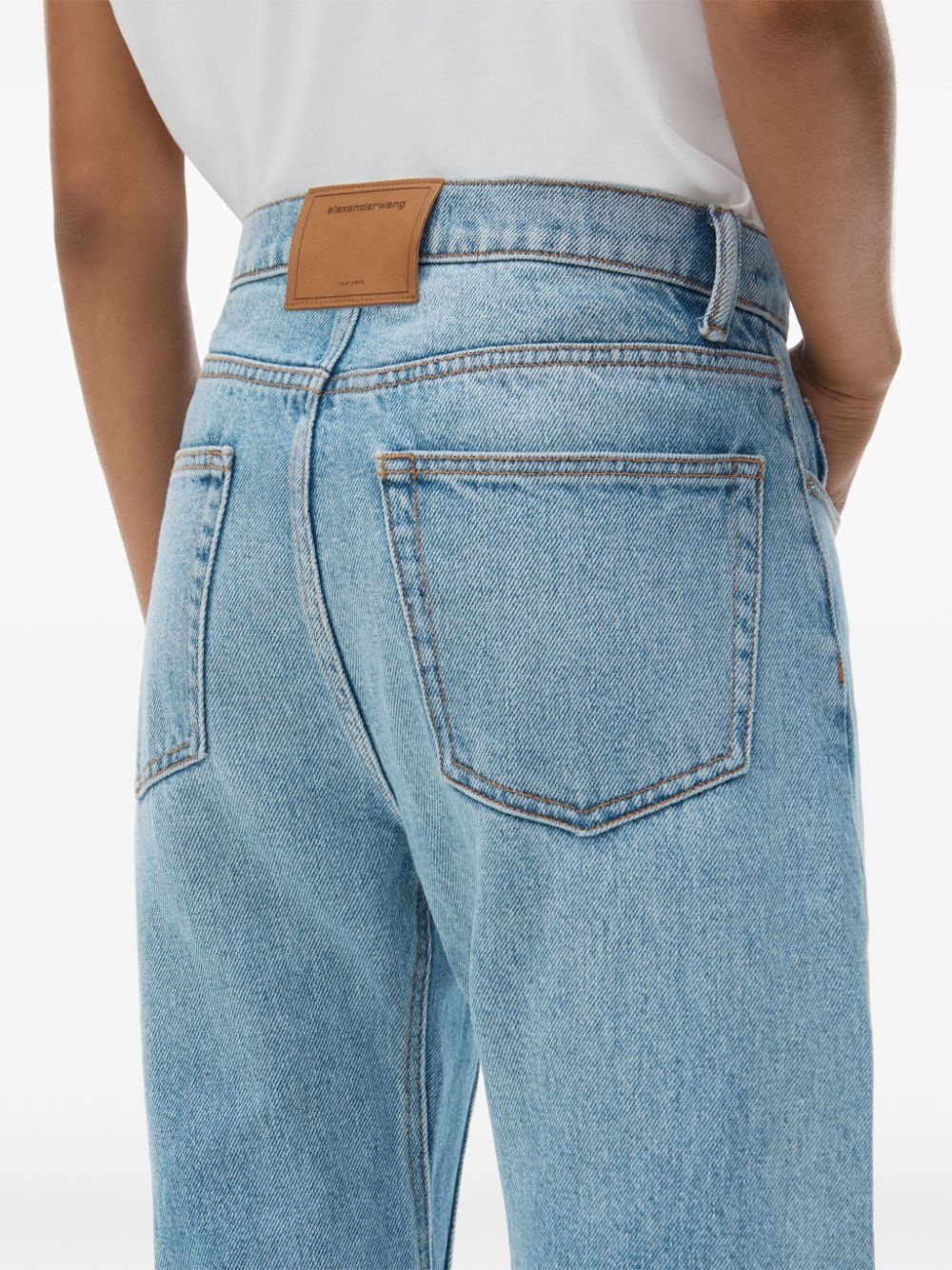 logo-embossed jeans - 5