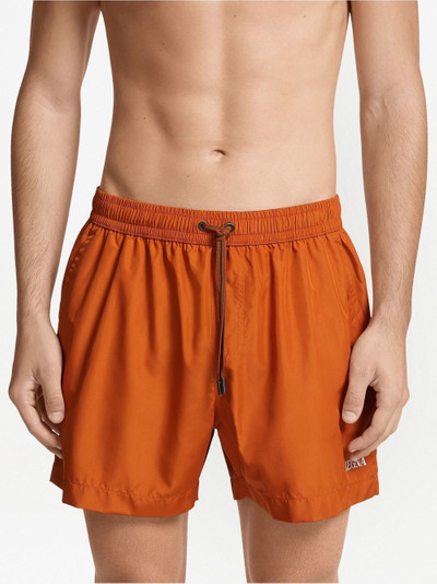 ZEGNA logo-print swim shorts outlook