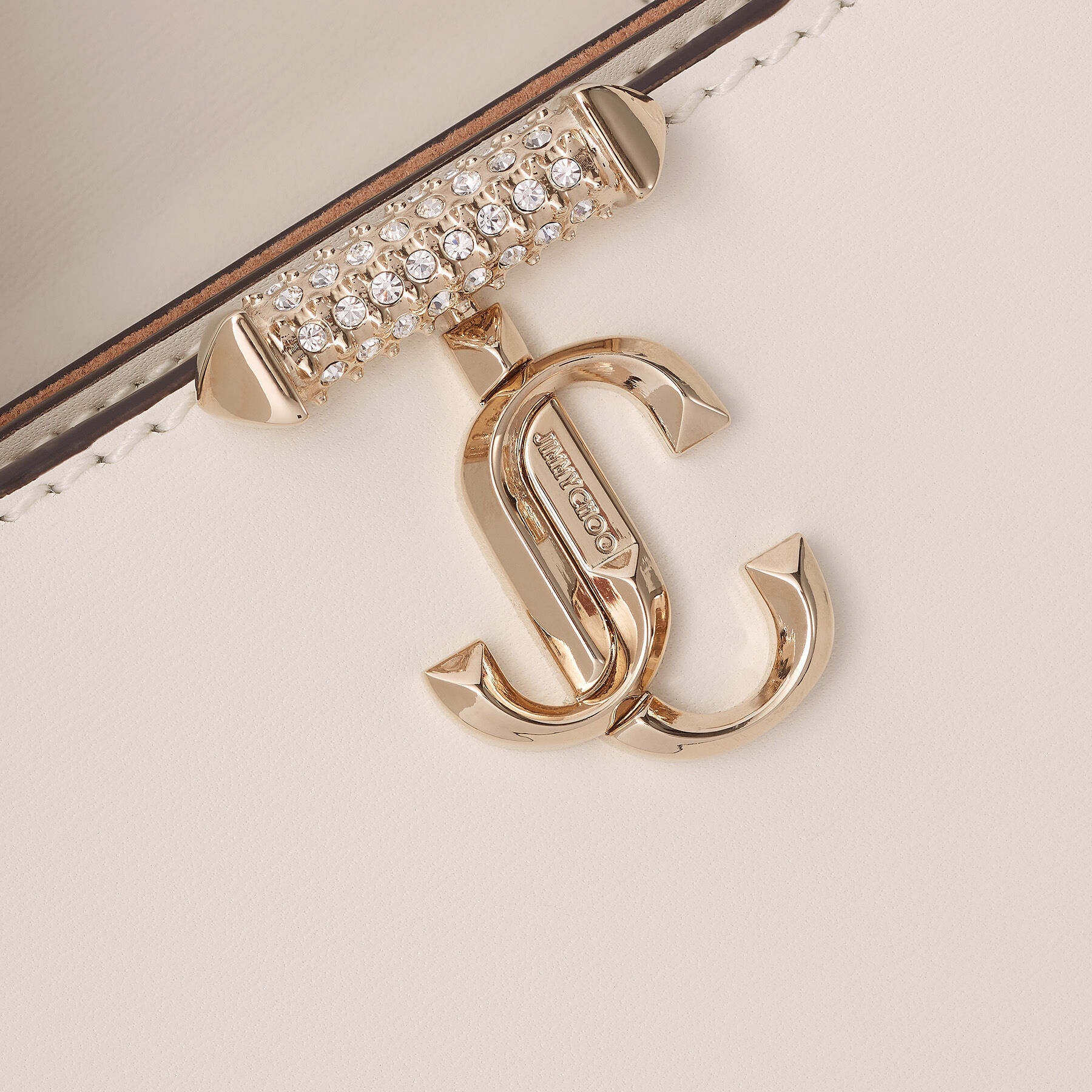 Varenne Top Handle Mini
Latte Leather Top Handle Bag with Crystal Bar and JC Emblem - 4