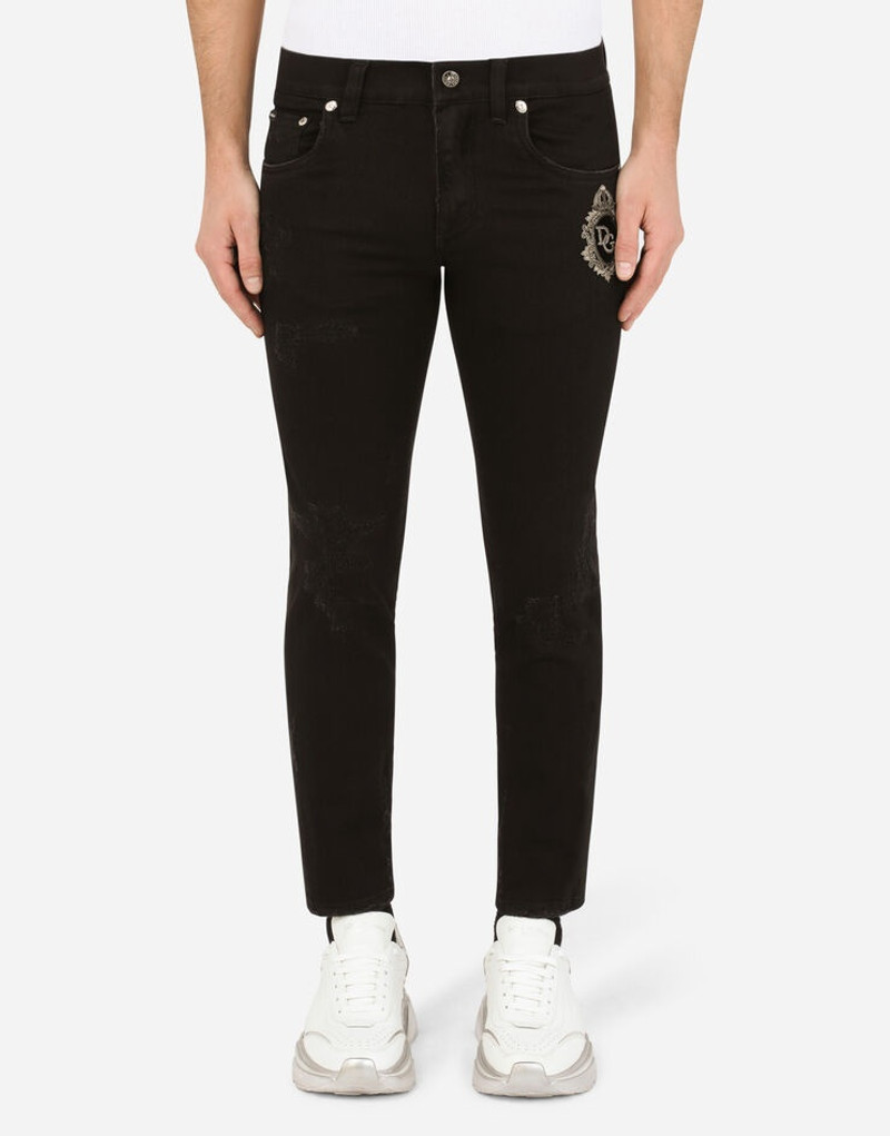 Black repaired skinny jeans with DG patch 1