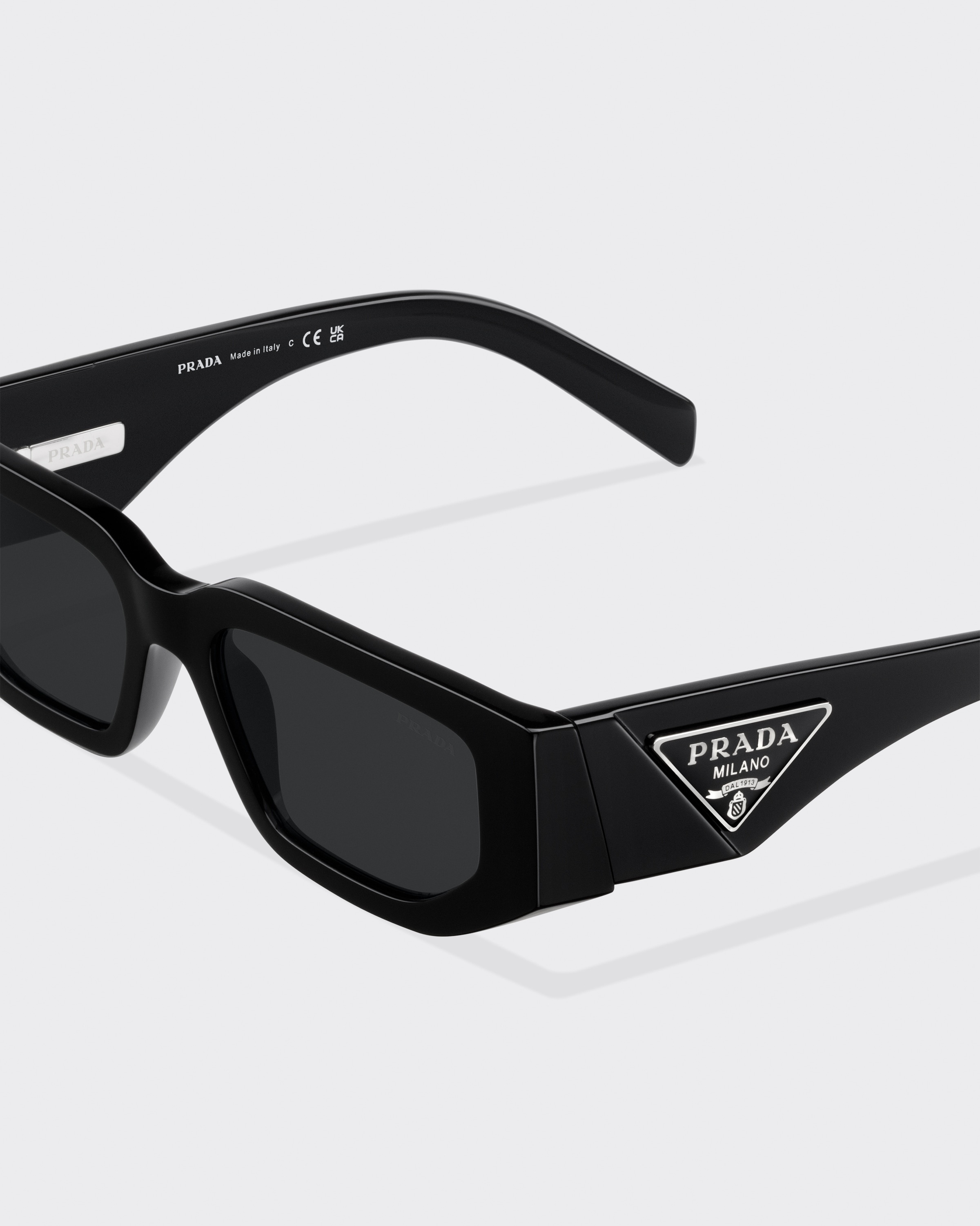 Prada Sunglasses with triangle logo | REVERSIBLE