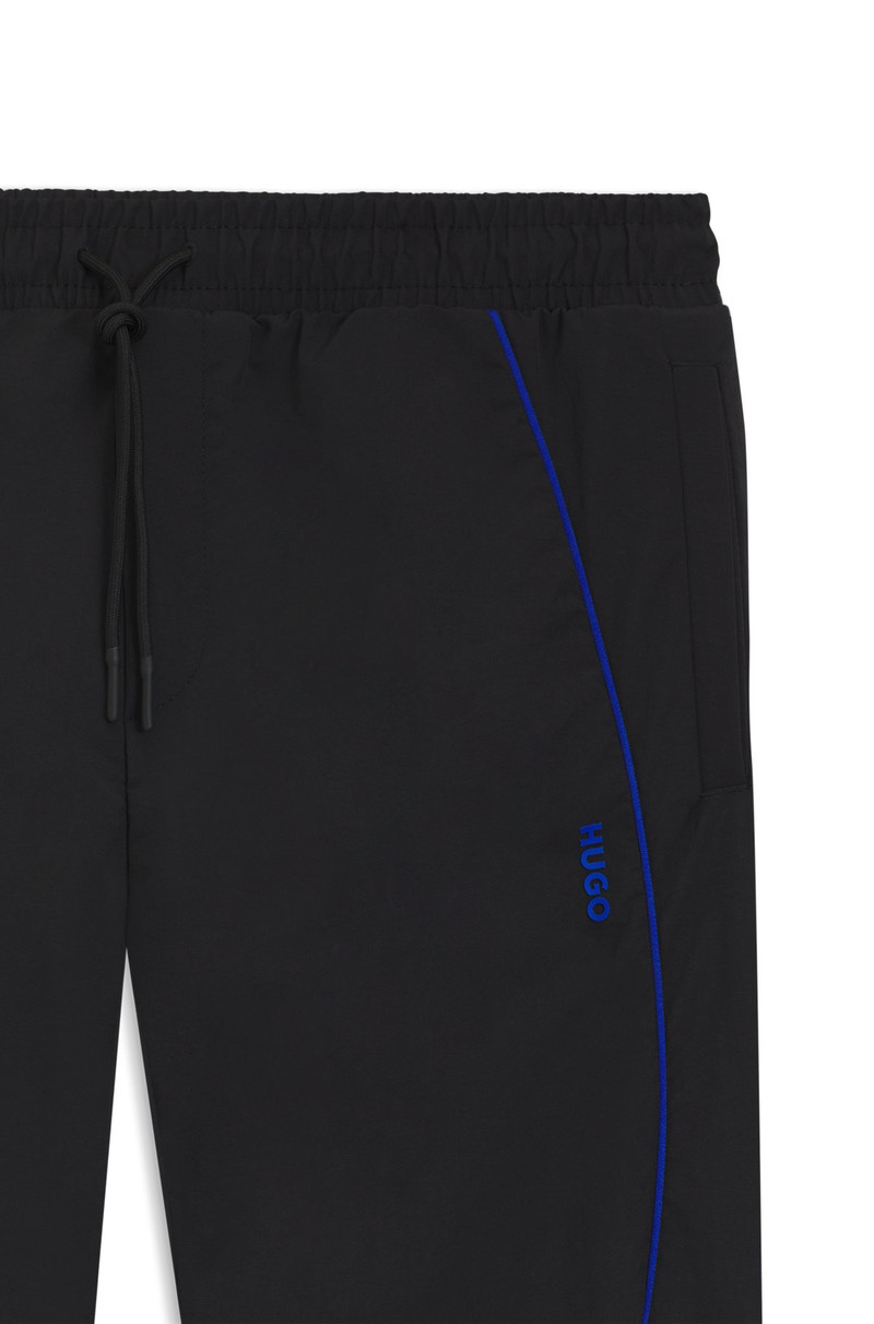 WATER-REPELLENT TROUSERS WITH LOGO AND PIPING 6
