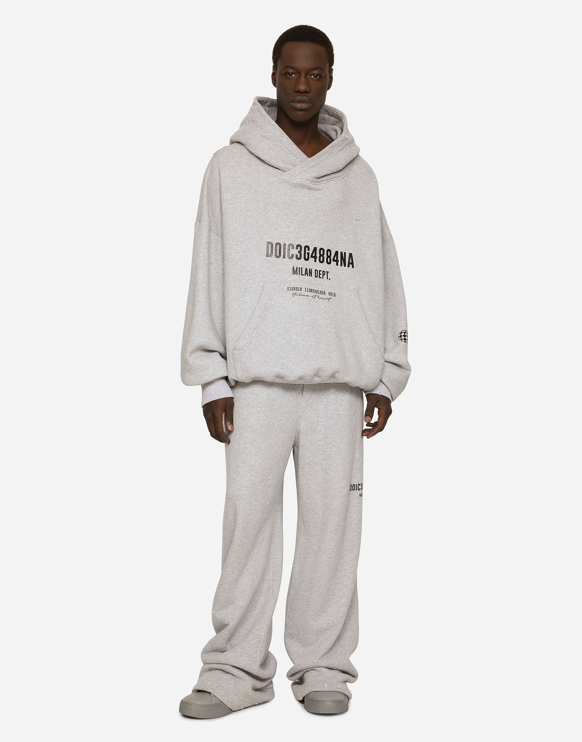 Printed jogging pants with small abrasions - 2