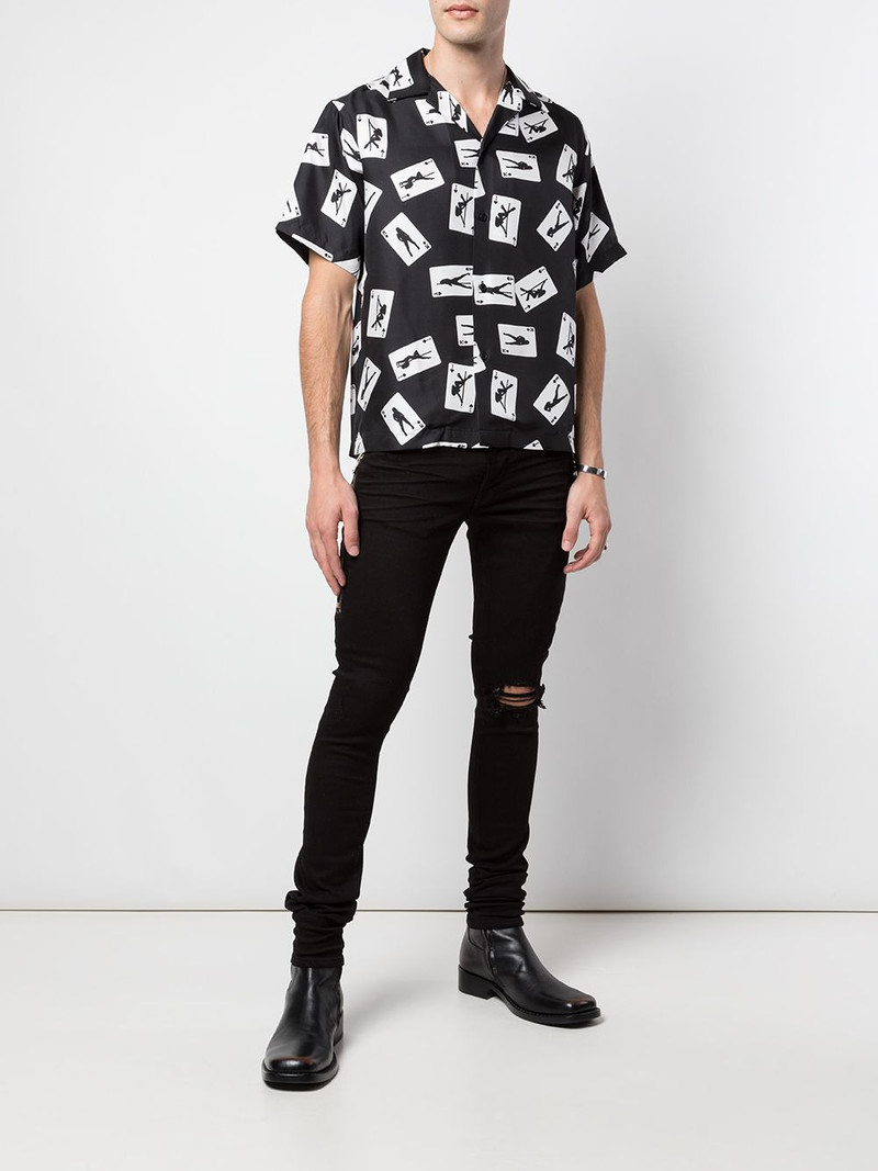 AMIRI mid rise distressed skinny jeans outlook