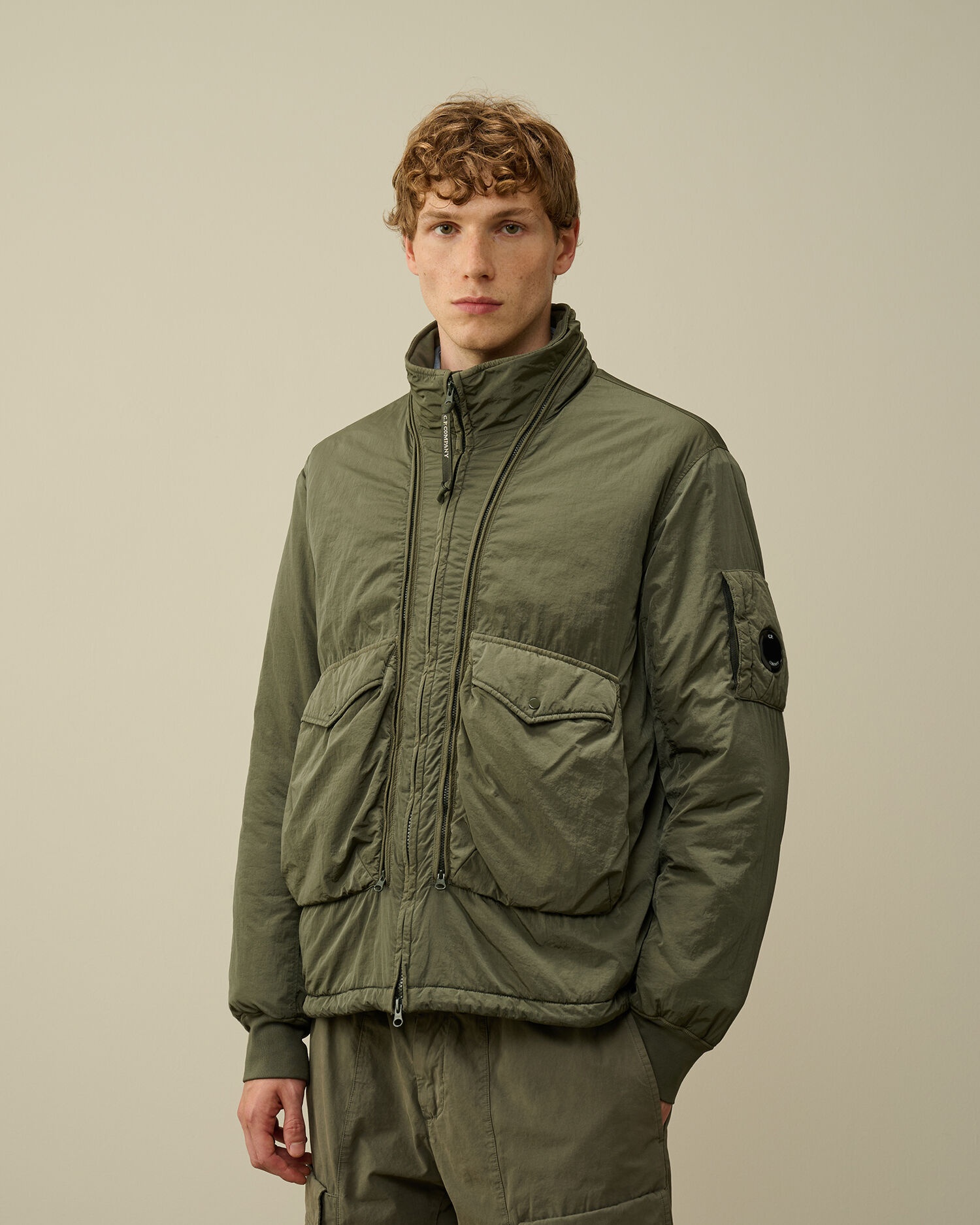 C.P. Company Chrome-R Body Zippers Padded Jacket | REVERSIBLE