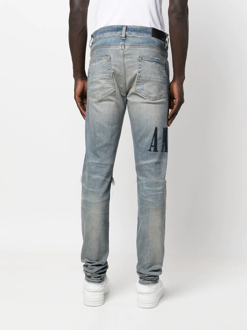 Appliqué-logo distressed jeans - 4