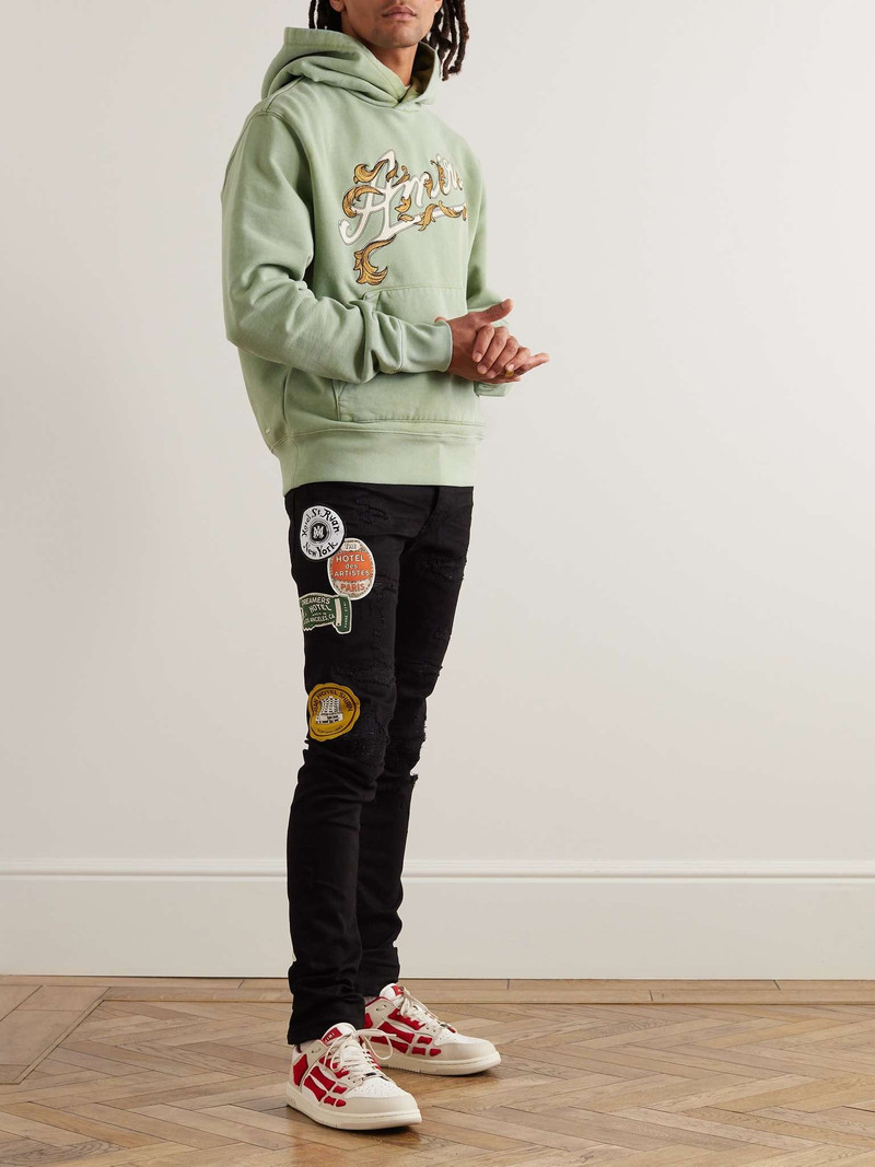 AMIRI Skinny-Fit Appliquéd Distressed Jeans outlook