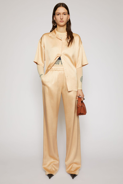 Acne Studios Satin trousers pale orange outlook