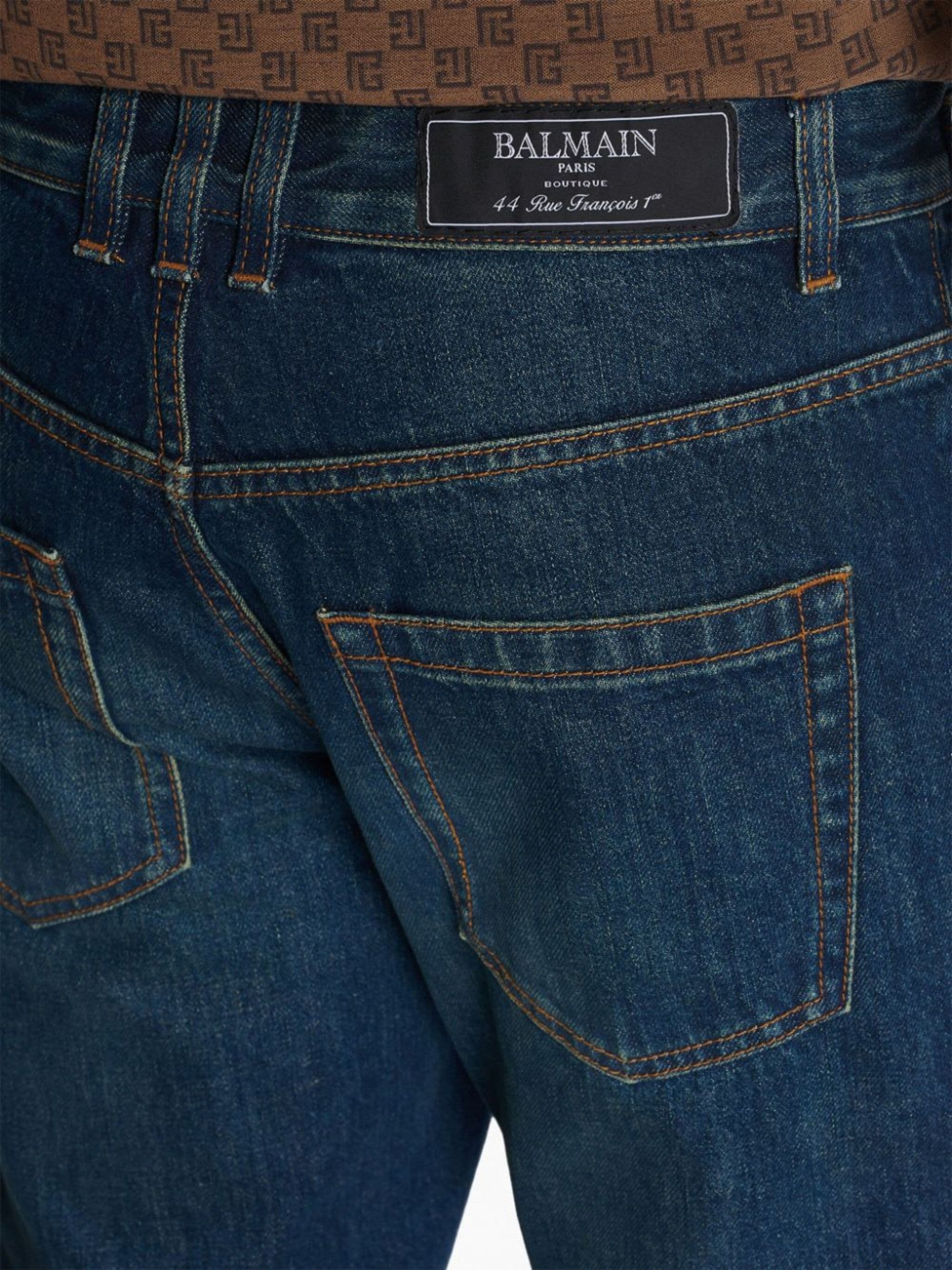 Vintage logo-patch straight-leg jeans - 7