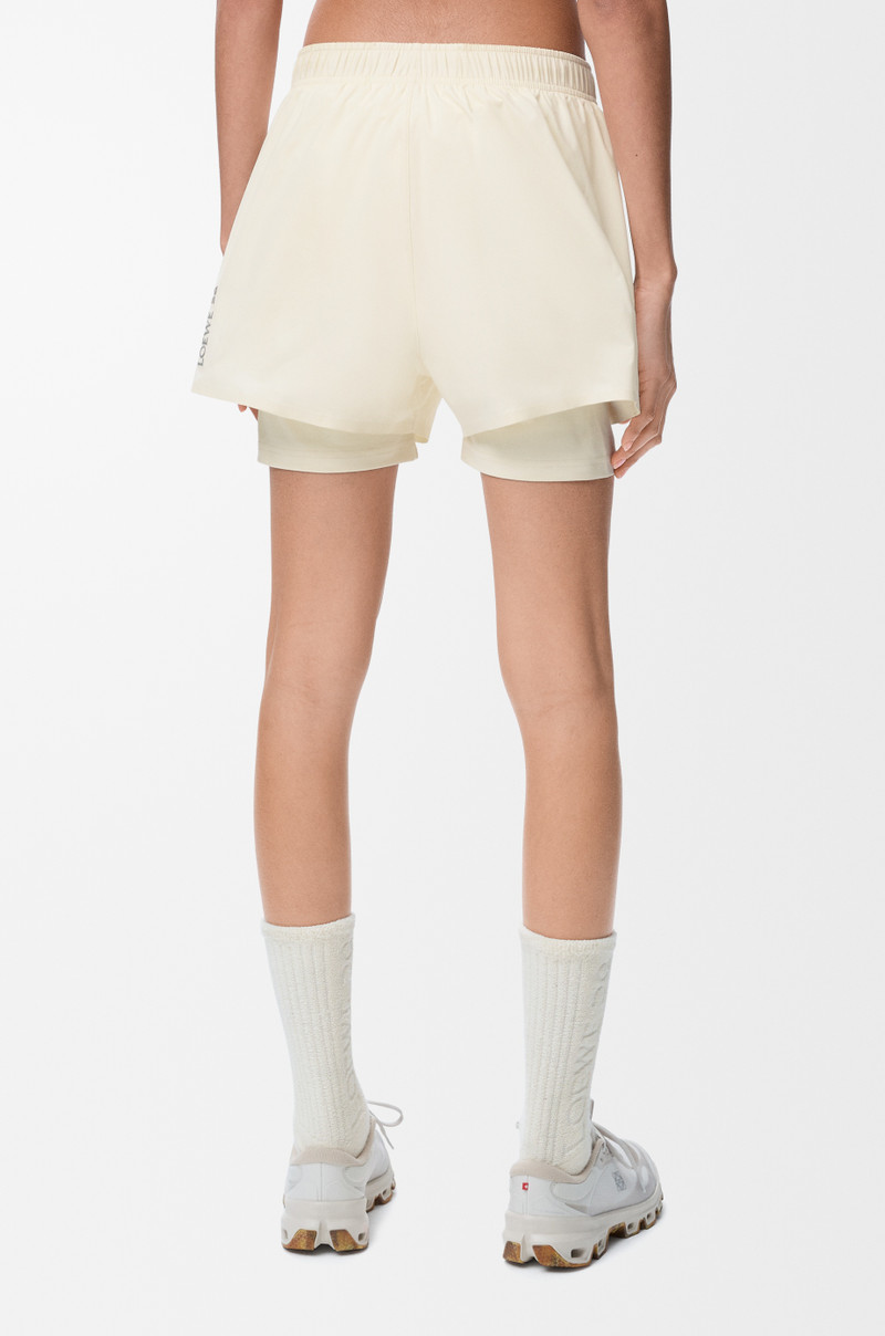 Performance shorts in technical shell 4