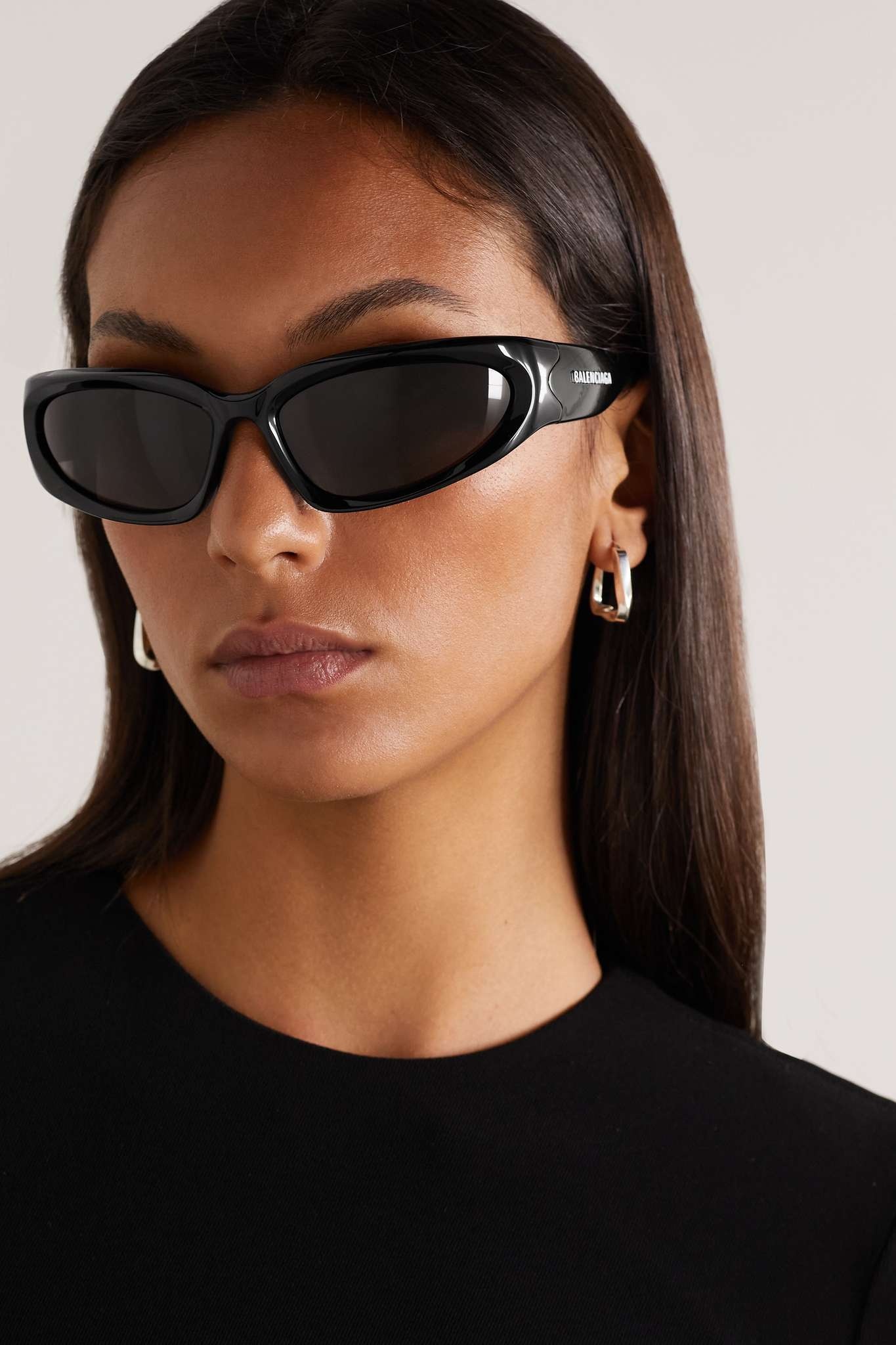 BALENCIAGA Swift Oval Sunglasses in Black | REVERSIBLE