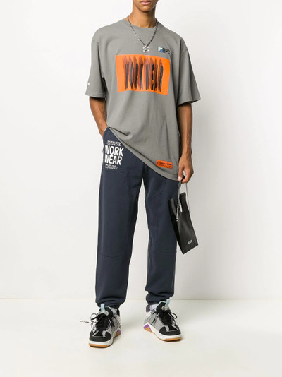 Heron Preston slogan print track pants outlook