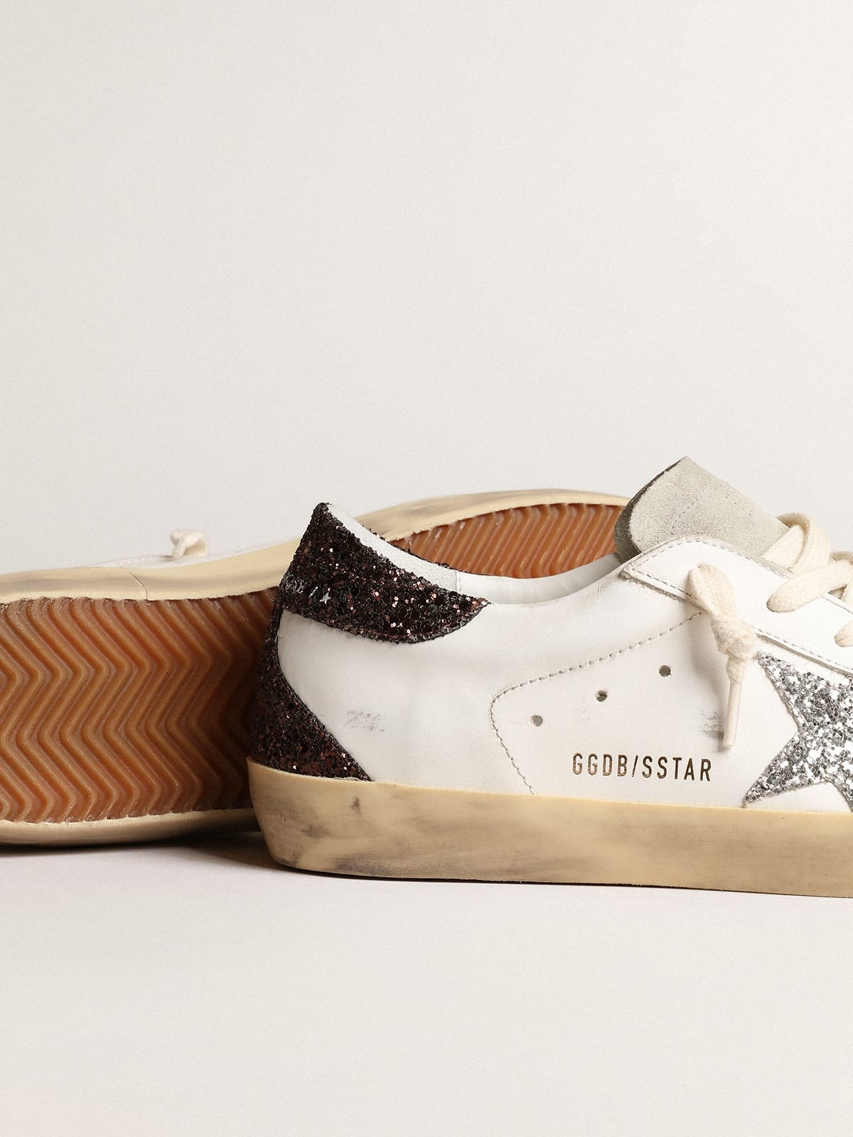 Golden Goose Super-Star with silver star and brown glitter