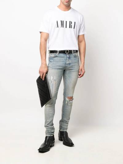 AMIRI logo-embroidered skinny jeans outlook