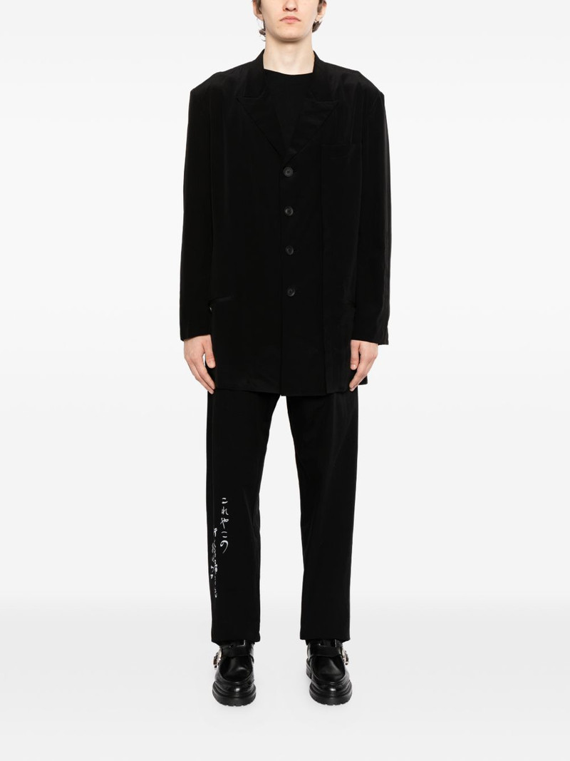 Yohji Yamamoto graphic-print tapered trousers outlook