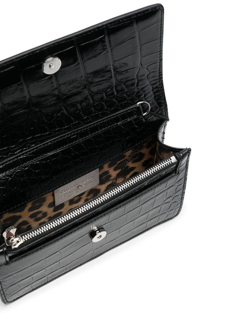 Superheroin crocodile-embossed clutch bag 5