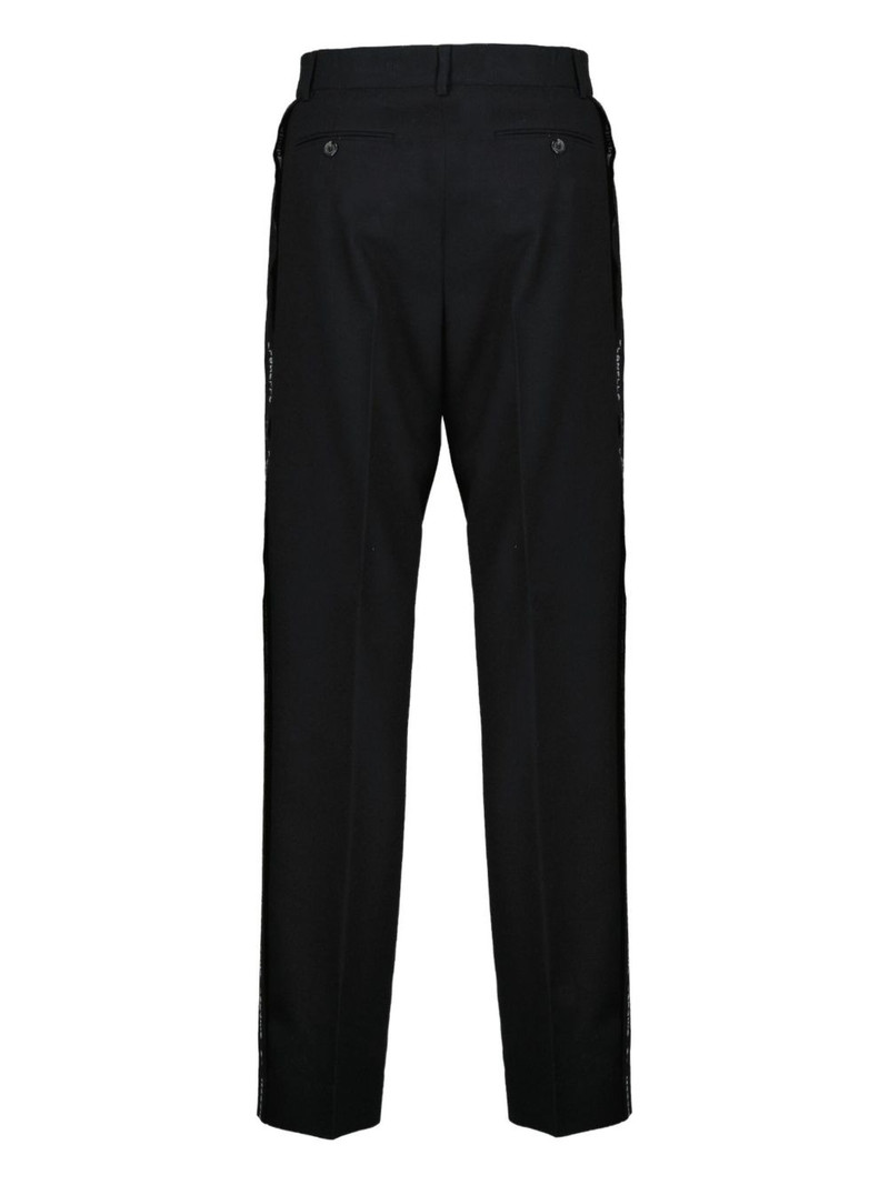 Moschino logo-trim trousers outlook