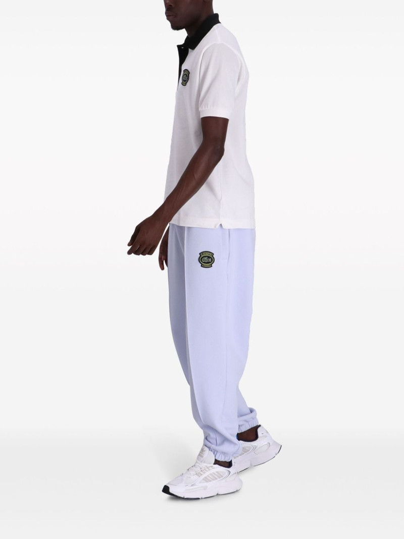 LACOSTE logo-appliquÃ© track pants outlook