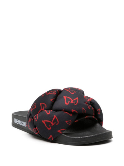 Moschino heart-print braided slides outlook