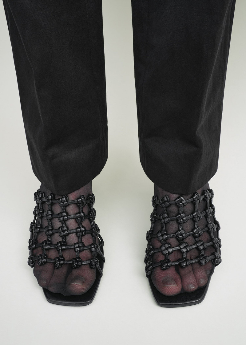 Totême Braided-leather bandeau mules black outlook