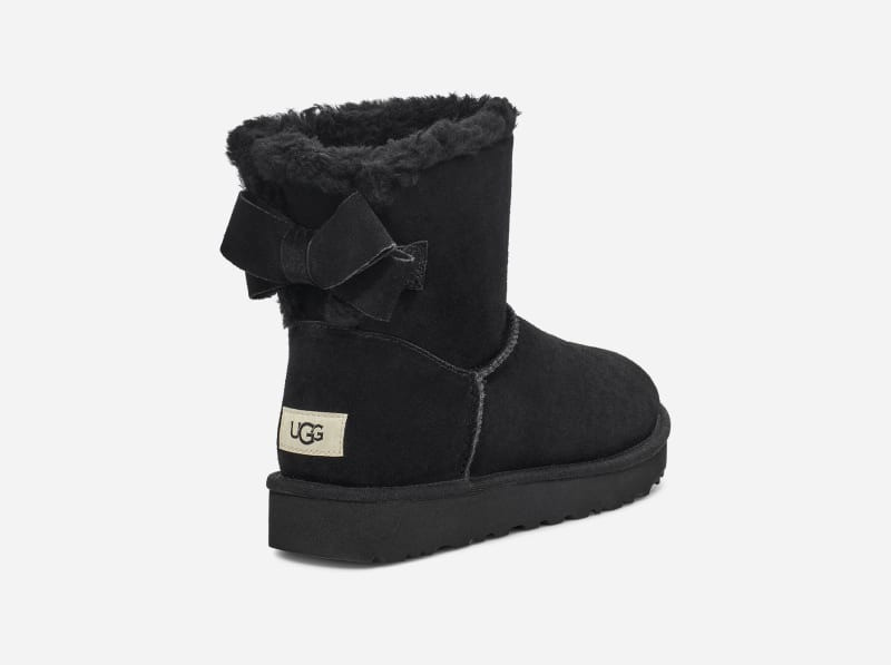 ® Women's Mini Bailey Suede Bow Classic Boots in Black 1