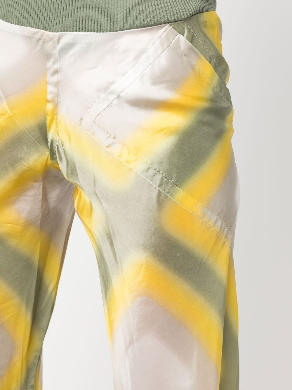 all-over graphic-print trousers - 5