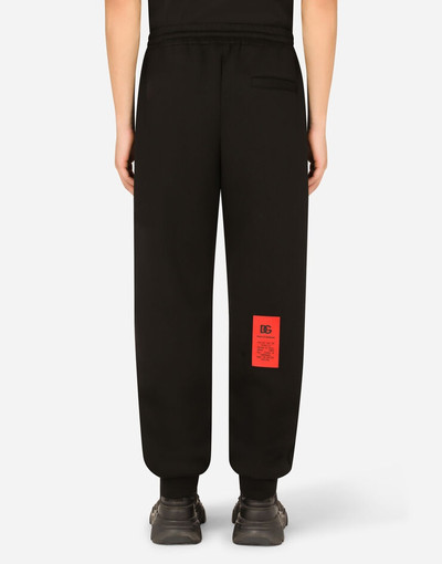 Dolce & Gabbana Cotton jogging pants with patch outlook