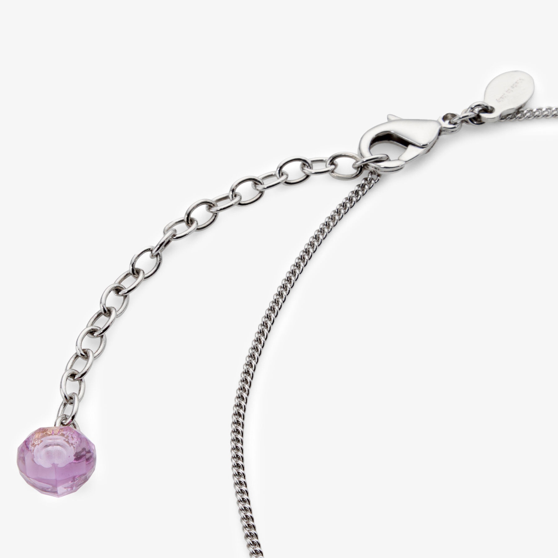 Faceted Heart Necklace
Silver/Tanzanite Heart Necklace - 3