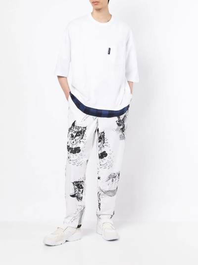 Comme des Garçons SHIRT graphic-print track pants outlook