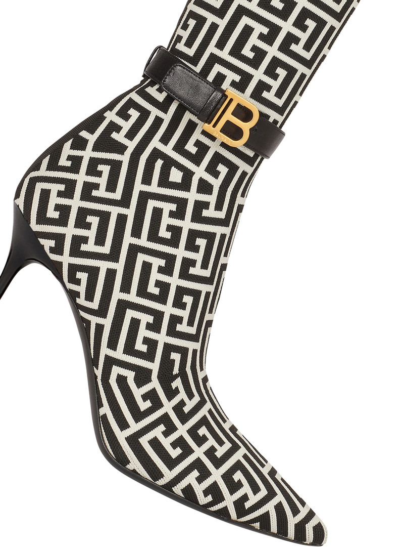 Balmain Raven monogrammed knit thigh-high boots outlook