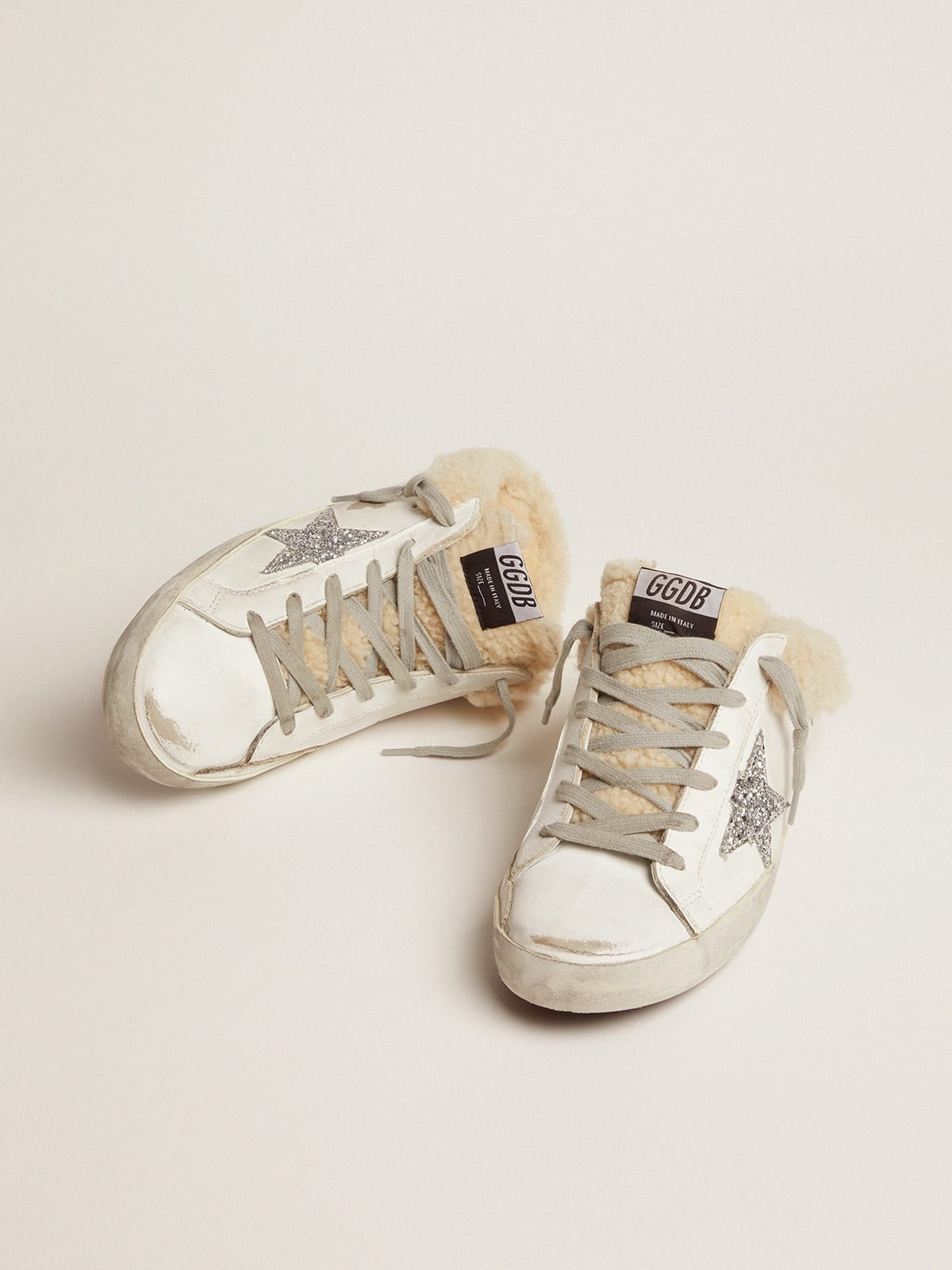 Golden Goose Super-Star Sabots in white leather with silver glitter star  and shearling lining | REVERSIBLE