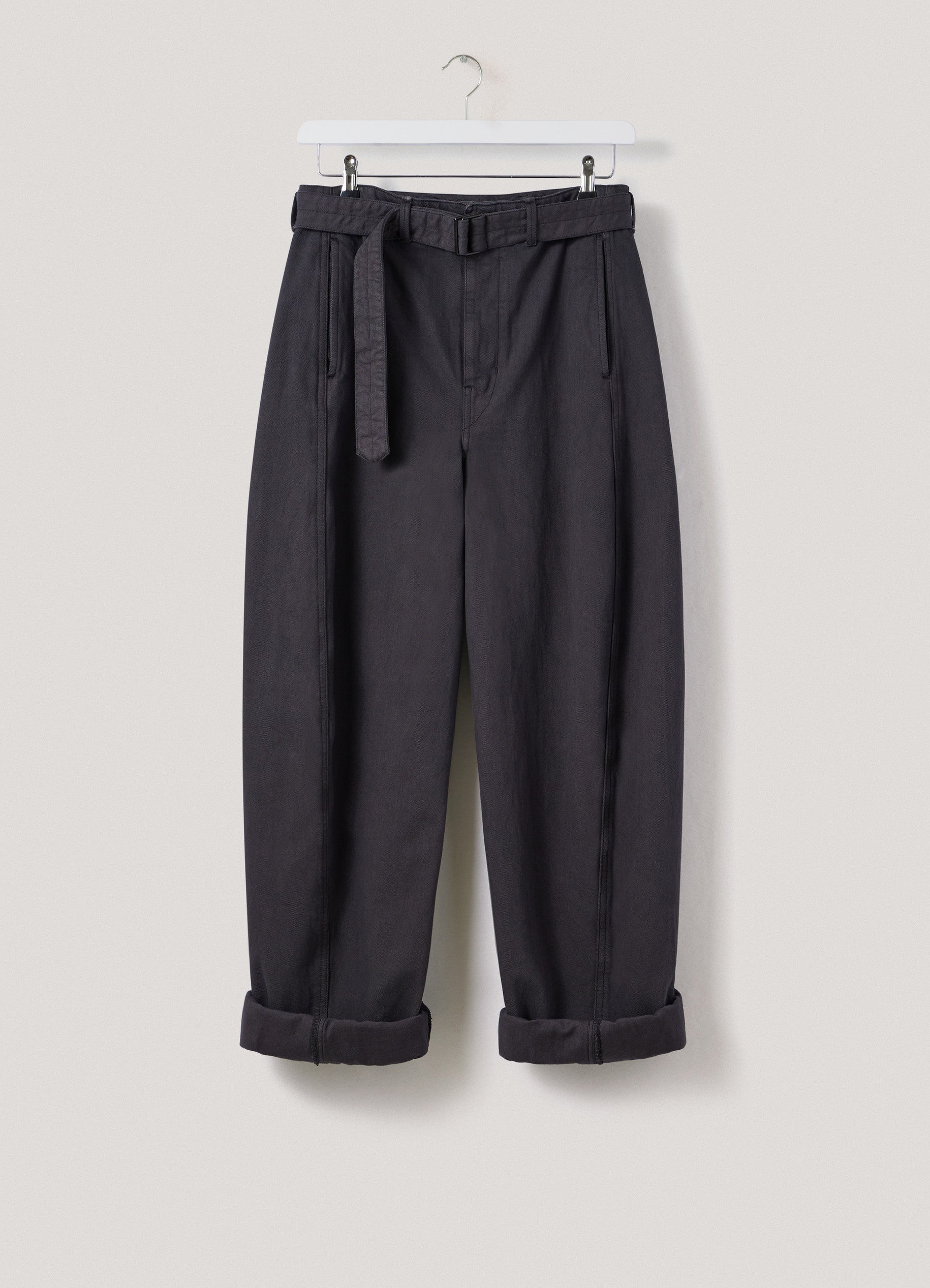 TWISTED BELTED PANTS
HEAVY GARMENT DYED DENIM - 1