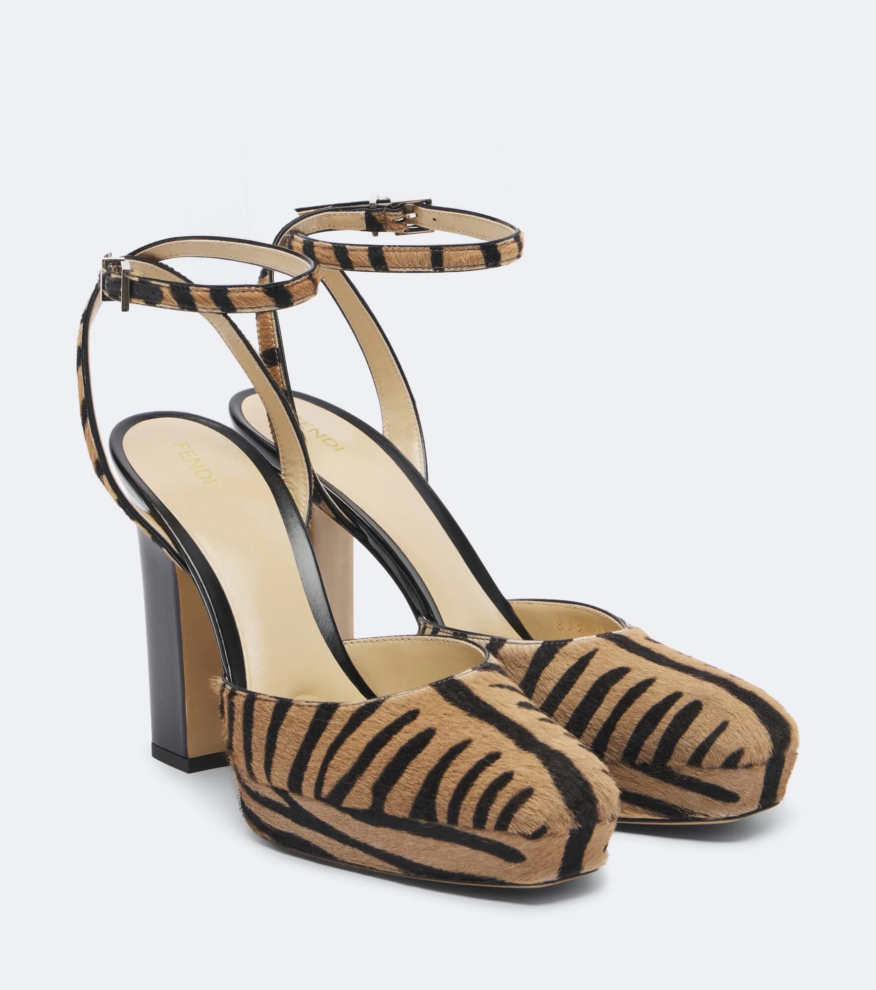 Tiger-print calf hair platform pumps - 1