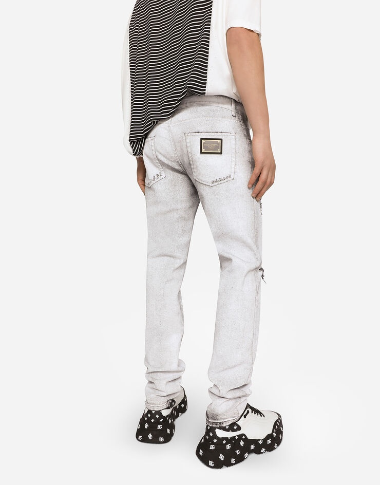 Coated skinny stretch jeans with rips - 4