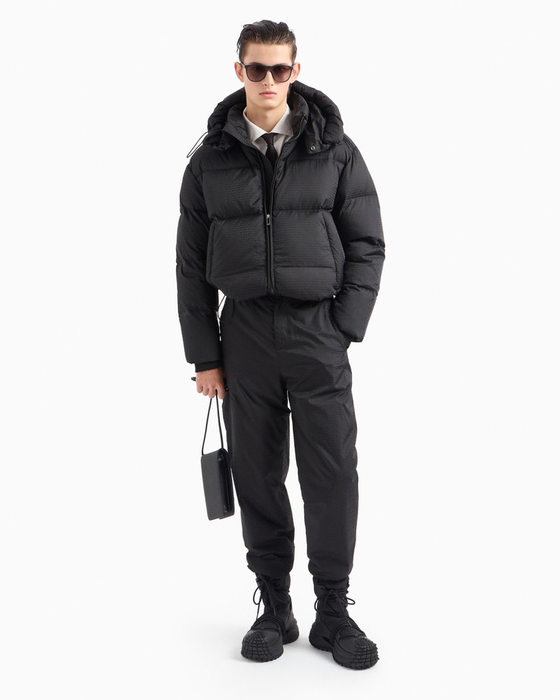 EMPORIO ARMANI Zipped, hooded down jacket in jacquard nylon with all-over logo lettering outlook